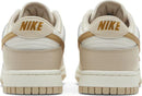 Dunk Low “Gold Swoosh”